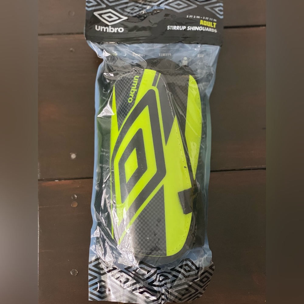 Adult stirrup shinguards